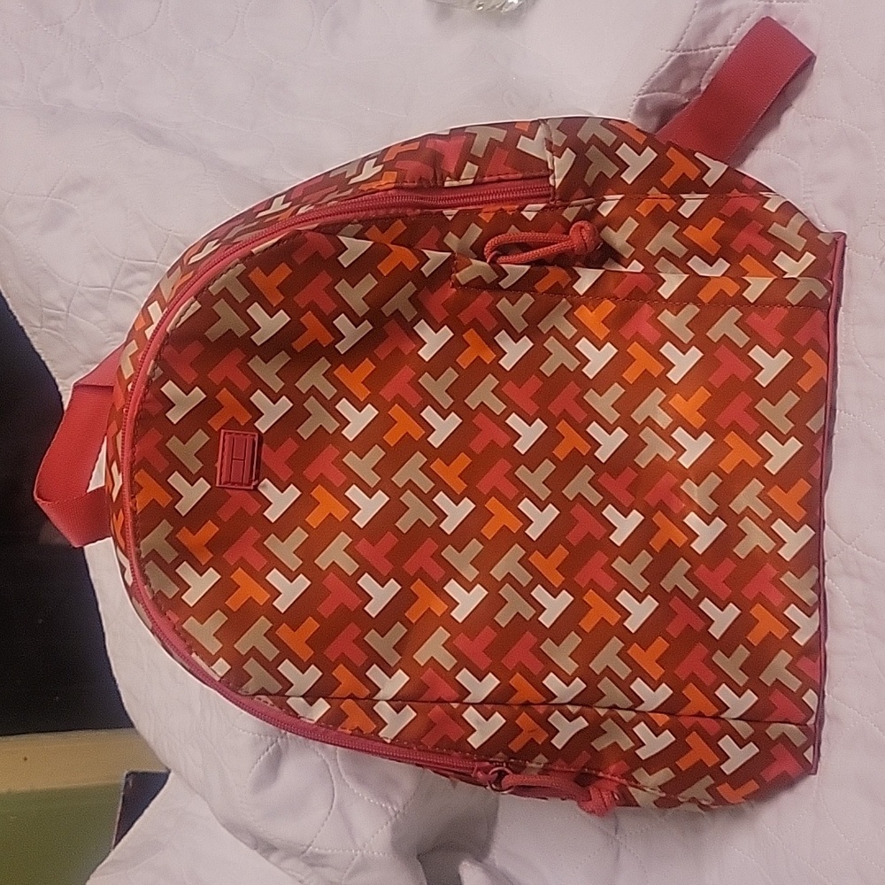 Tommy Hilfiger mini backpack vibrant colors used but nice condition.